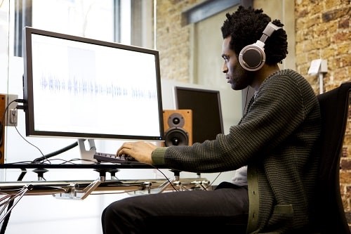 Employers who ignore the challenges of headphone use at work risk enforcement action, potential prosecution and civil liability through employee claims for hearing damage. Photograph: iStock